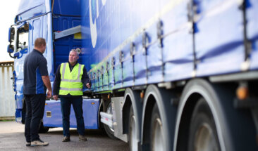 Driver checking truck